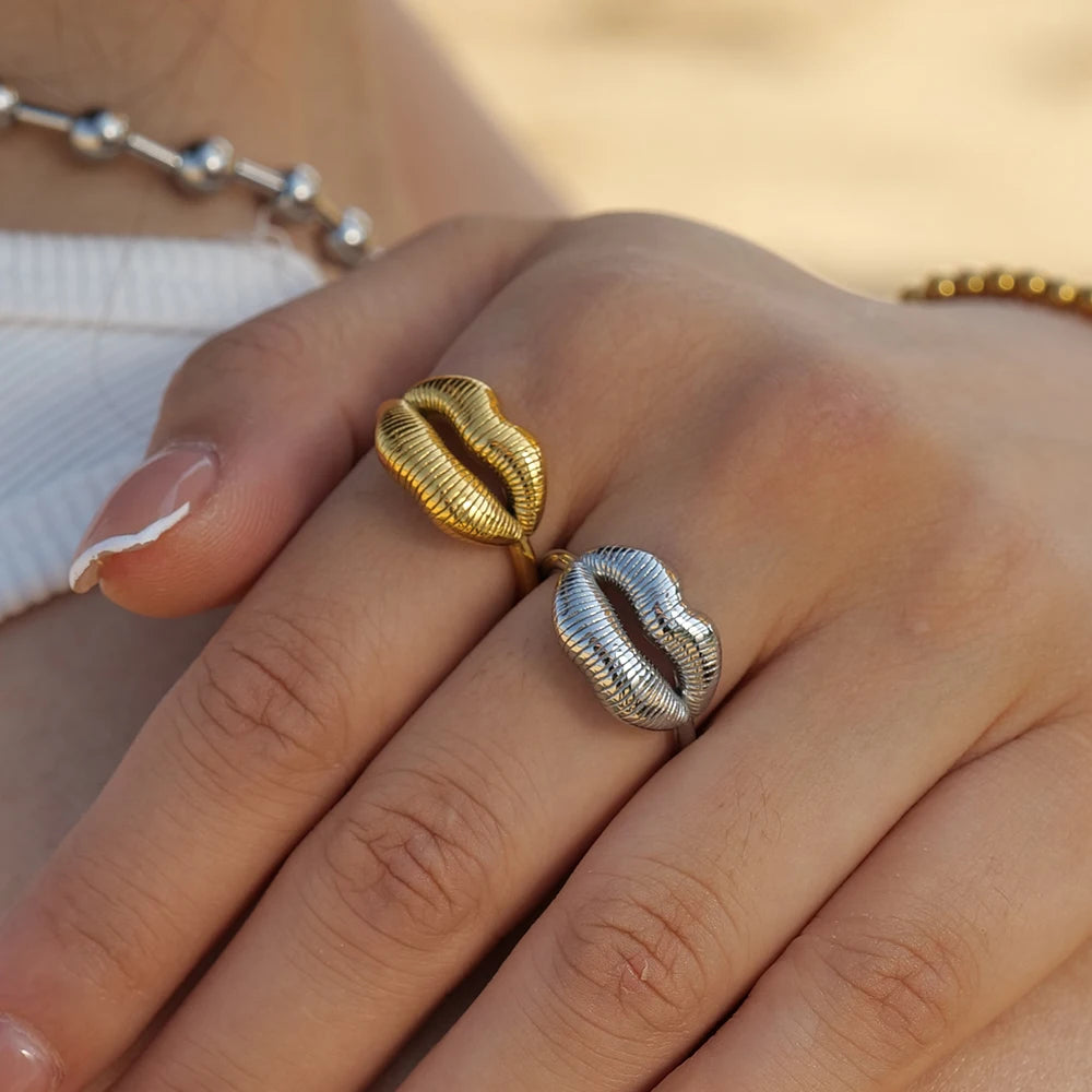 Bold Lip Design Ring . Crafted from high-quality stainless steel and finished with 18K gold PVD plating, this statement piece blends playful charm with sophisticated style. A perfect accessory for confident