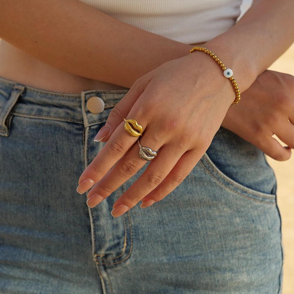Bold Lip Design Ring . Crafted from high-quality stainless steel and finished with 18K gold PVD plating, this statement piece blends playful charm with sophisticated style. A perfect accessory for confident