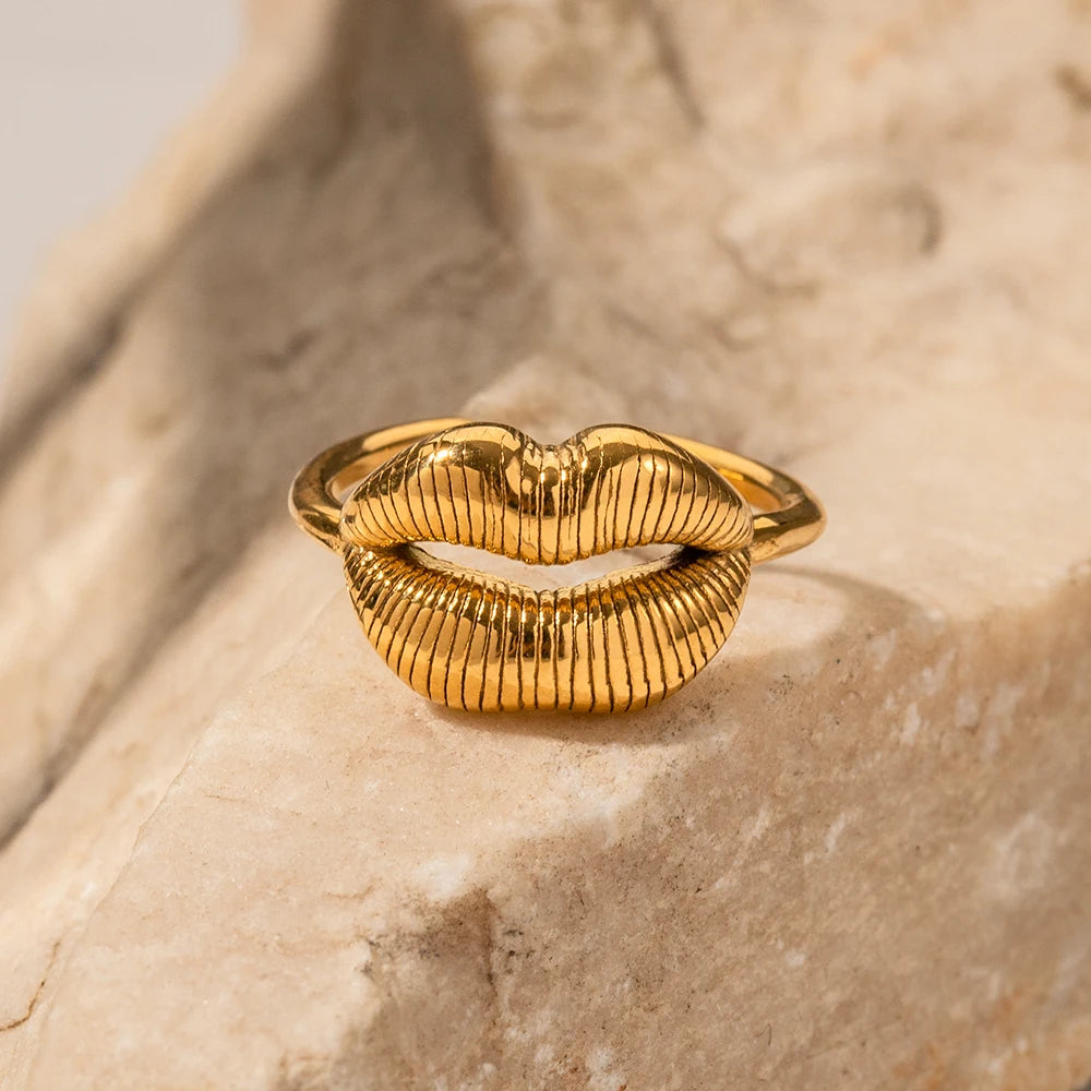 Bold Lip Design Ring . Crafted from high-quality stainless steel and finished with 18K gold PVD plating, this statement piece blends playful charm with sophisticated style. A perfect accessory for confident