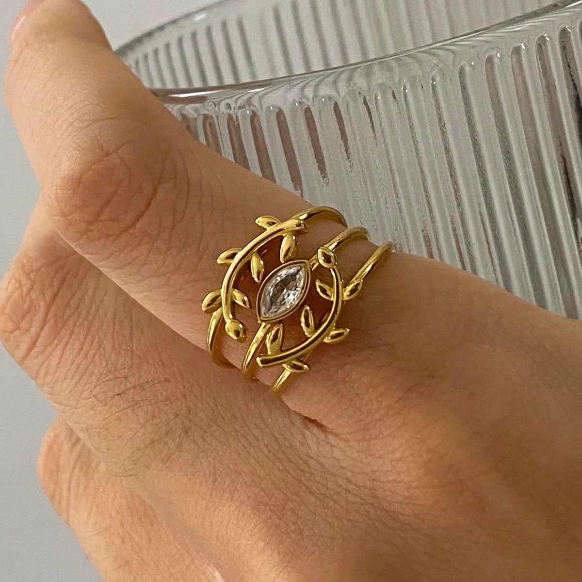 Minimalist 3-Piece Ring Set . Stainless Steel Stackable Rings with Zircon Accents and Ribbed Flower Detail for Effortless Style