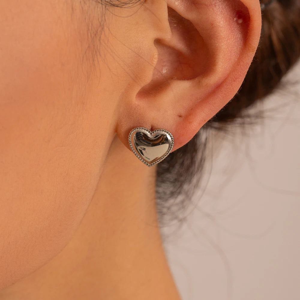 Elegant Double Heart Drop Earrings . 18K Gold Plated Stainless Steel with Smooth Titanium Finish, A Timeless Symbol of Love & Sophistication