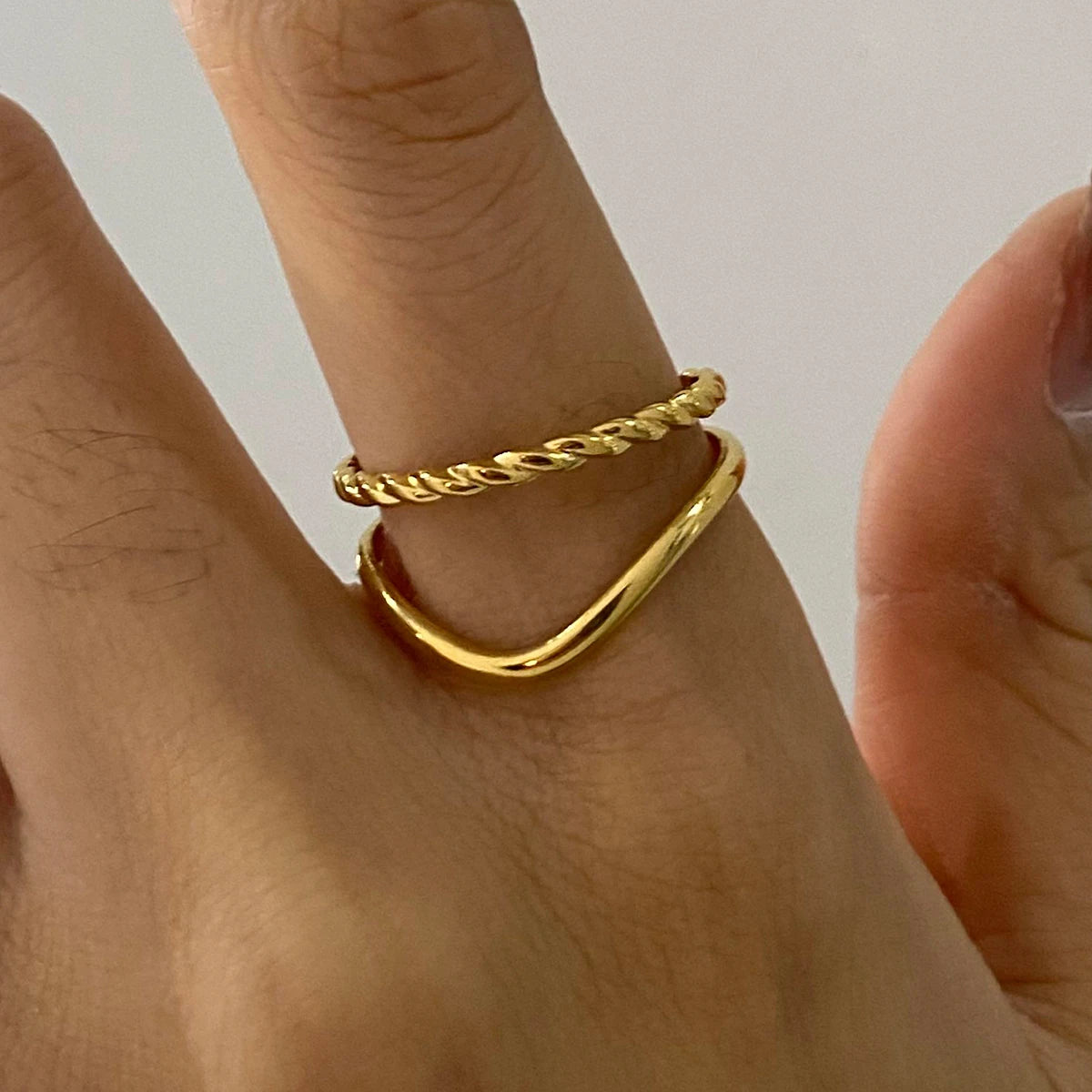 Minimalist 3-Piece Ring Set . Stainless Steel Stackable Rings with Zircon Accents and Ribbed Flower Detail for Effortless Style