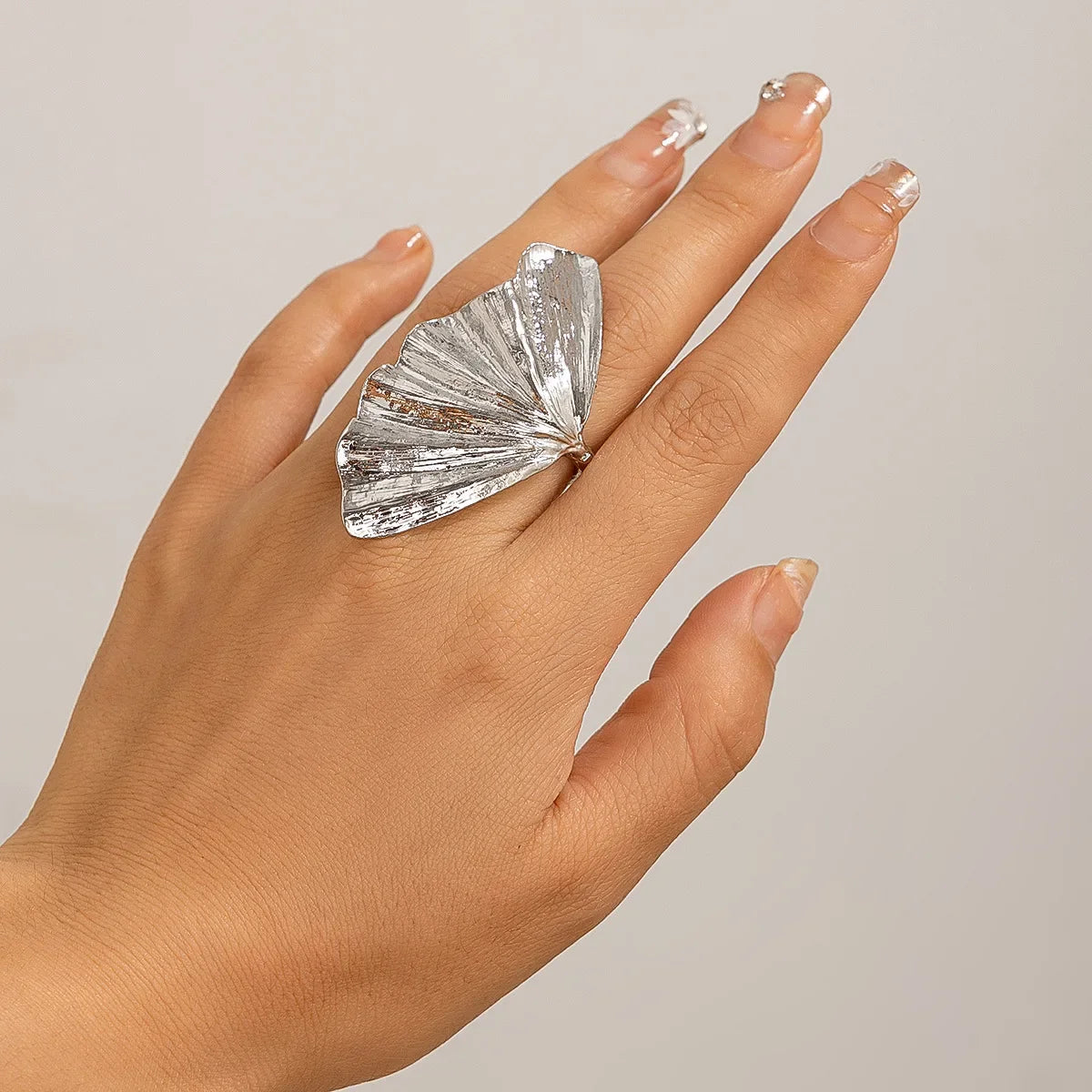 Ginkgo Leaf Statement Ring . Classic Metal Fan-Shaped Design with Pleated Texture.Trend Piece for Bold, Nature-Inspired Looks . Perfect for Punk Parties & Summer Vibes