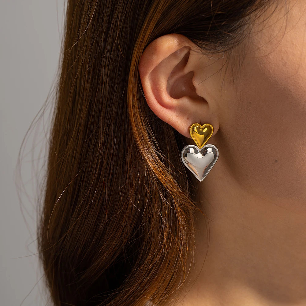 Elegant Double Heart Drop Earrings . 18K Gold Plated Stainless Steel with Smooth Titanium Finish, A Timeless Symbol of Love & Sophistication