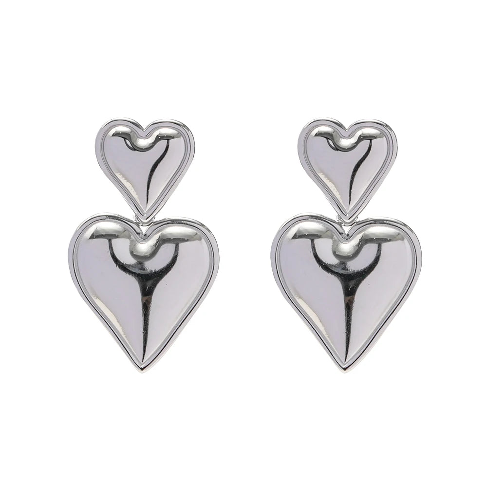 Elegant Double Heart Drop Earrings . 18K Gold Plated Stainless Steel with Smooth Titanium Finish, A Timeless Symbol of Love & Sophistication