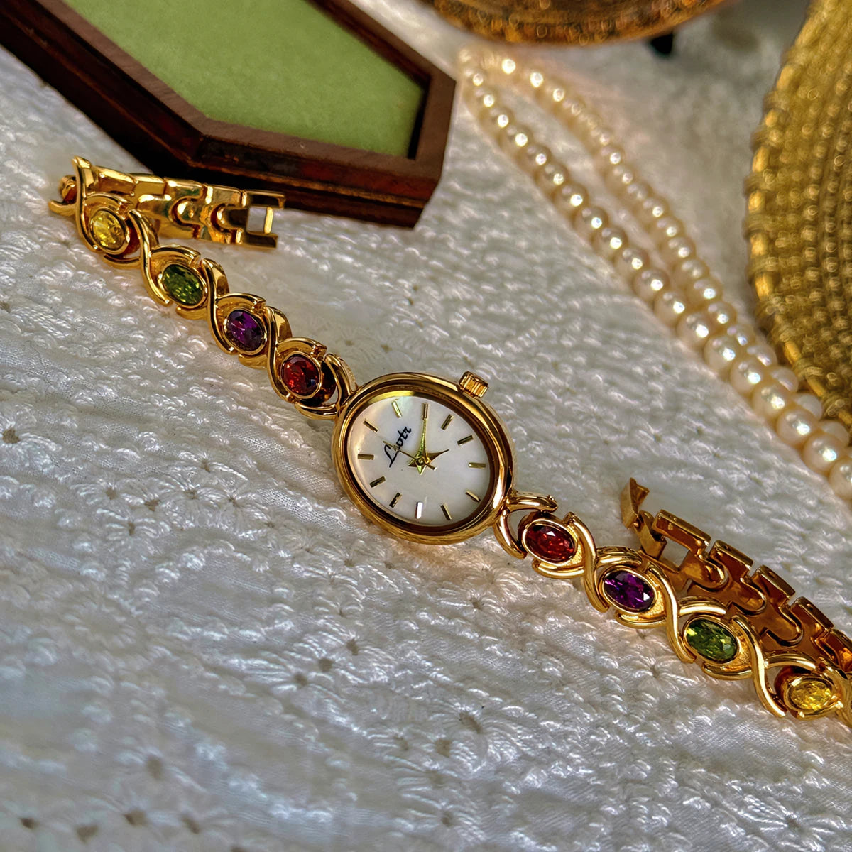 High-End Luxury Women's Watch . 1PC Elegant Oval Mother of Pearl Dial, Adorned with Colorful Tourmalines & Sparkling Diamonds . Timeless Statement Timepiece