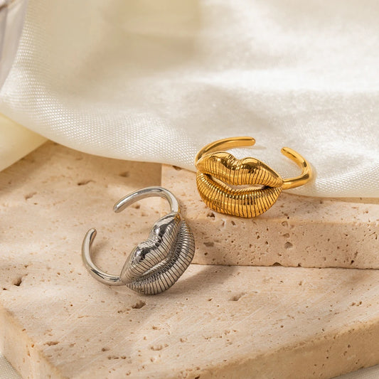 Bold Lip Design Ring . Crafted from high-quality stainless steel and finished with 18K gold PVD plating, this statement piece blends playful charm with sophisticated style. A perfect accessory for confident