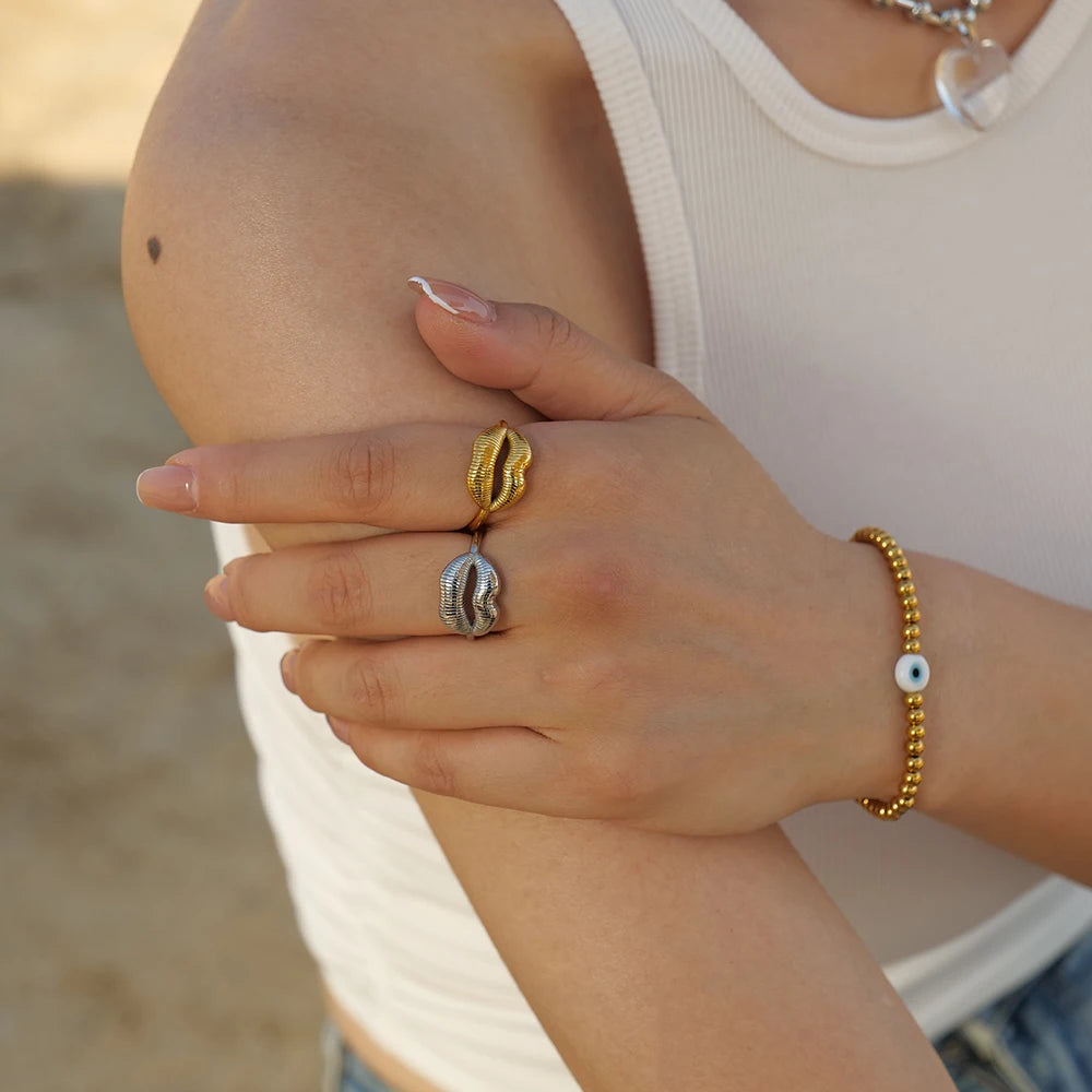 Bold Lip Design Ring . Crafted from high-quality stainless steel and finished with 18K gold PVD plating, this statement piece blends playful charm with sophisticated style. A perfect accessory for confident