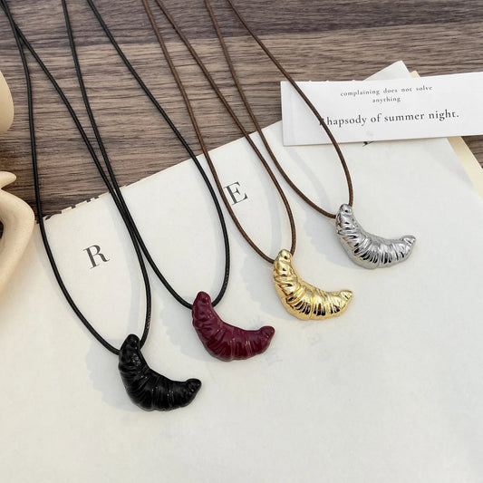 Minimalist Cow Horn Pendant Necklace . Light Luxury Long Sweater Chain on Leather Rope, A Chic and Stylish Jewelry Piece for Women .Perfect for Layering & Everyday Elegance